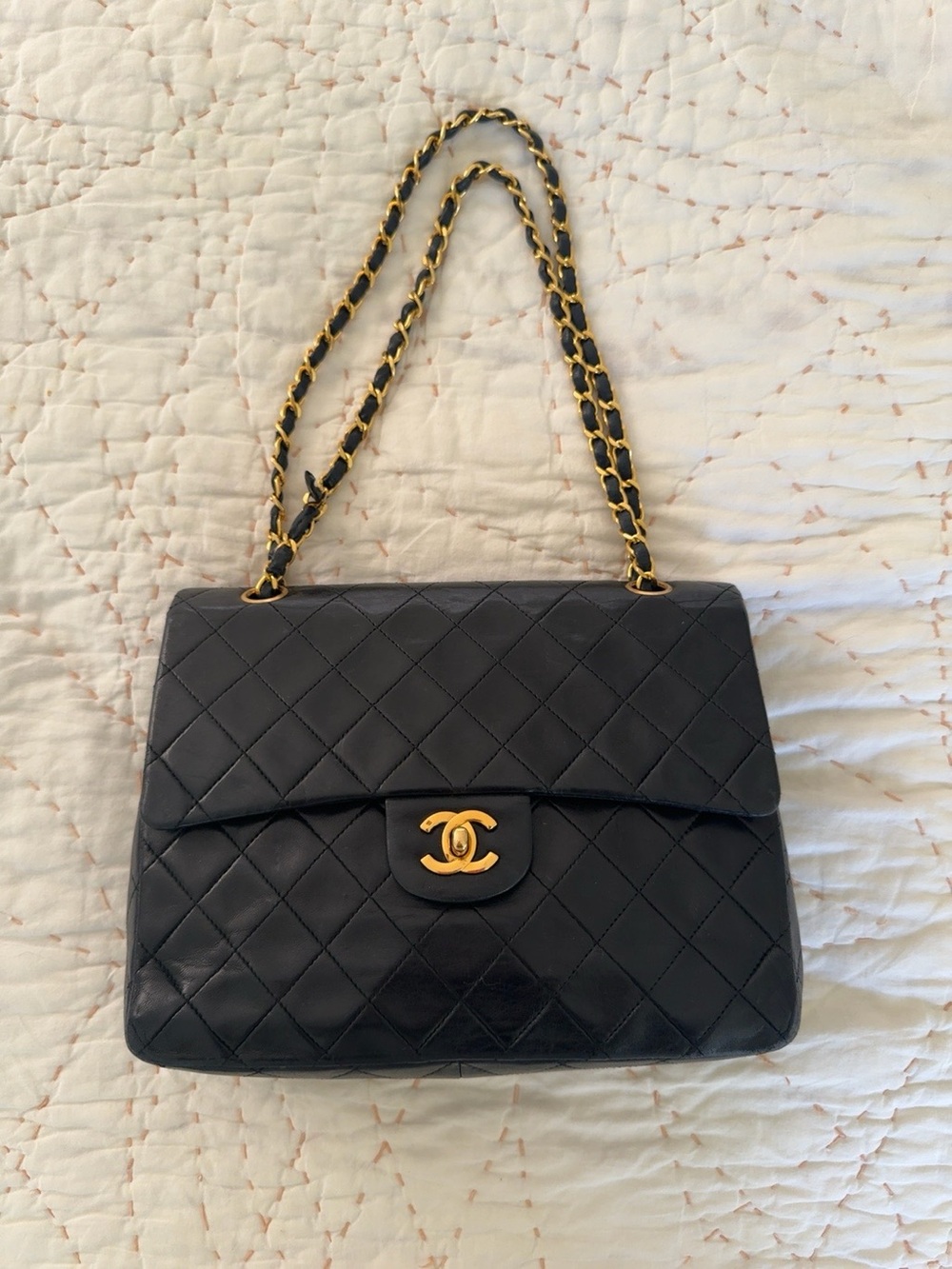 CHANEL Black Quilted Leather Shoulder Bag with Gold Hardware